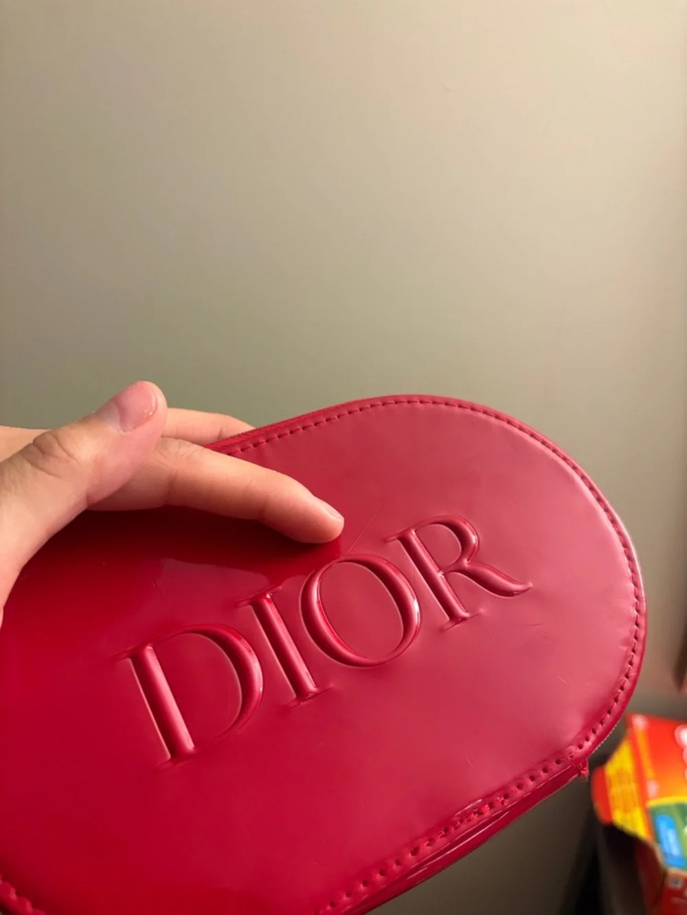 Dior Red Patent Oval Cosmetic Case with Embossed Logo